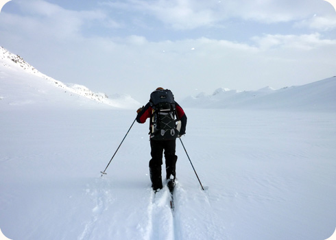 A client skiing in Norway