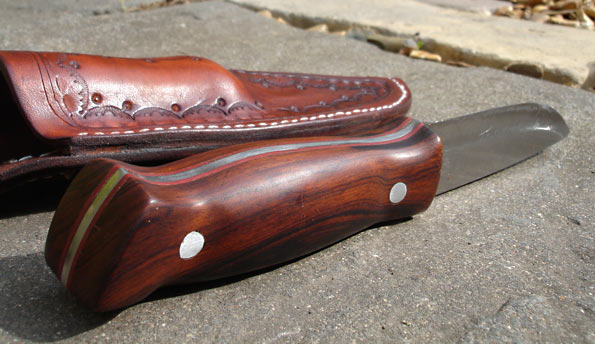 The desert ironwood handle complete with red liners