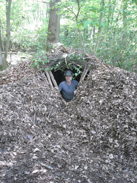 A leaf litter shelter built on the Fundamental Bushcraft course